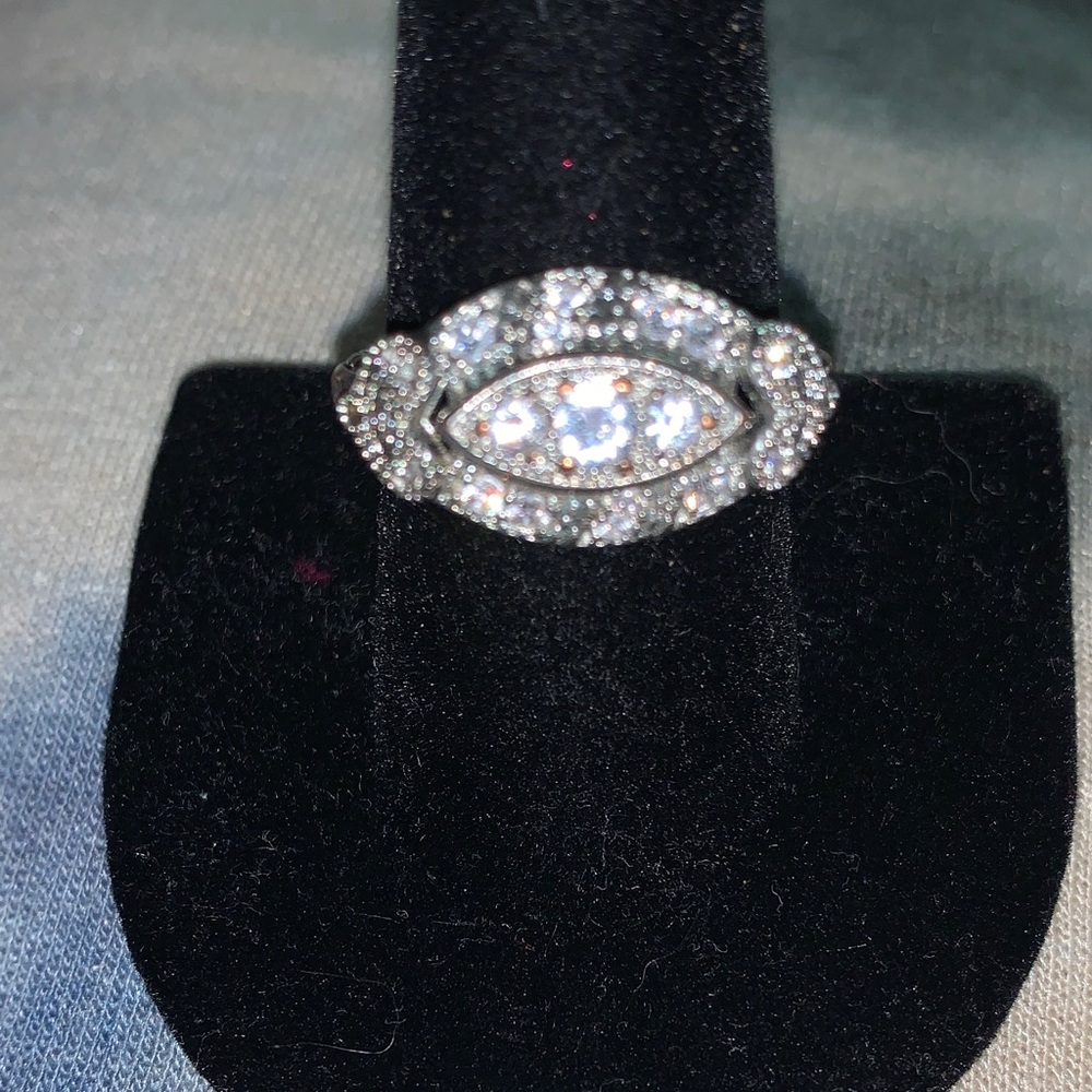 1950 gold princess cut ring with diamonds. It’s a timeless part of our heirloom.